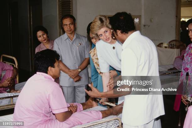 Diana, Princess of Wales visits the Sitanala Leprosy Hospital in Tangerang, Greater Jakarta, Indonesia, November 1989. She is wearing a dress by...