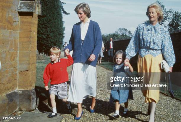 Diana, Princess of Wales with her son Prince Harry and her mother Frances Shand Kydd at St Mary's Church in Great Brington, Northamptonshire, for a...