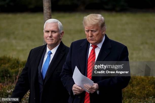 Vice President Mike Pence and U.S. President Donald Trump arrive for a signing ceremony for the United States-Mexico-Canada Trade Agreement on the...