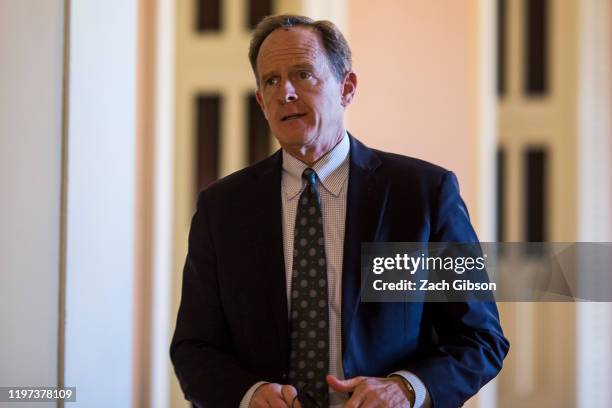 Sen. Patrick Toomey walks through the Capitol Building during the Senate impeachment trial of President Donald Trump at the U.S. Capitol on January...