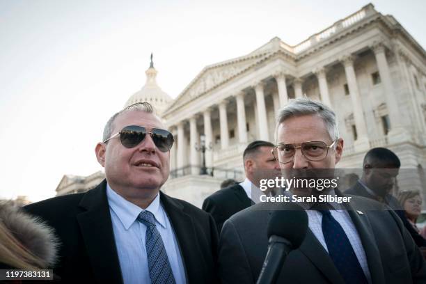 Lev Parnas, an associate of President Donald Trump's personal lawyer Rudy Giuliani, and his lawyer Joseph Bondy are seen outside of the U.S. Capitol...