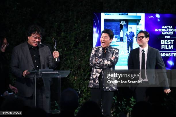 Bong Joon-ho, Song Kang-ho, and Han Jin-won speak onstage at the 9th AACTA International Awards at Mondrian Los Angeles on January 03, 2020 in West...