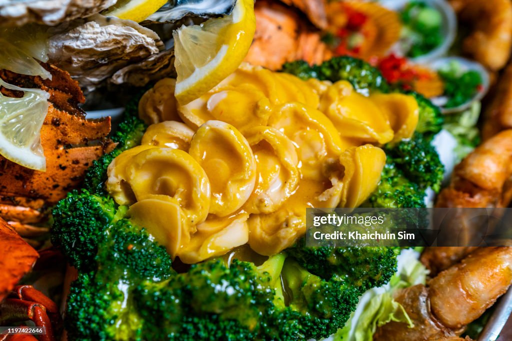 Seafood barbecue platter, focus on abalone