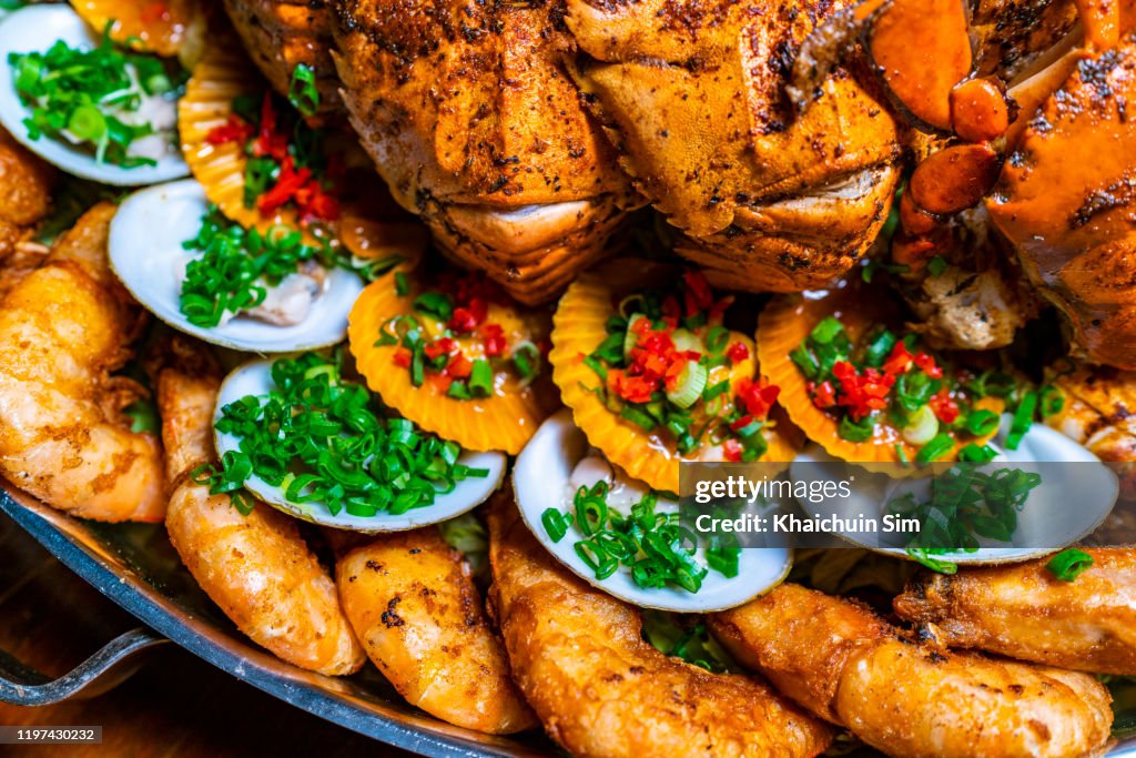 Seafood barbecue platter, focus on scallop