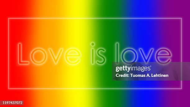 "love is love" text on rainbow colored background - pride gradient stock pictures, royalty-free photos & images