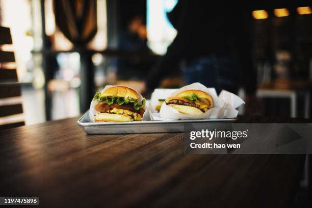 king of burger - burger king stock pictures, royalty-free photos & images