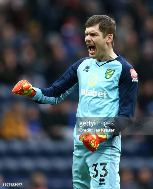 Michael McGovern of Norwich celebrates his team's first goal during the FA Cup Third Round match between Preston North End and Norwich City at...