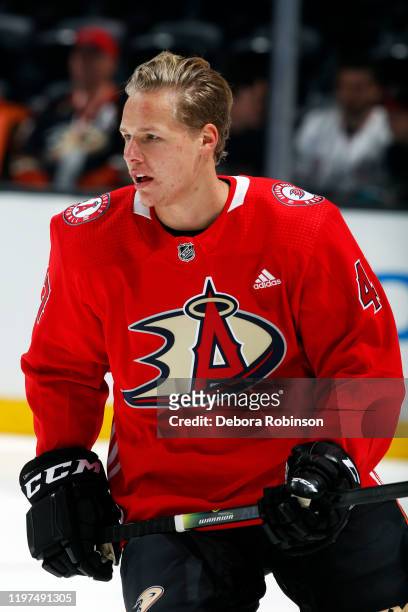 Hampus Lindholm of the Anaheim Ducks skates in warm-ups while wearing a special jersey for Angels Night prior to the game against the Arizona Coyotes...