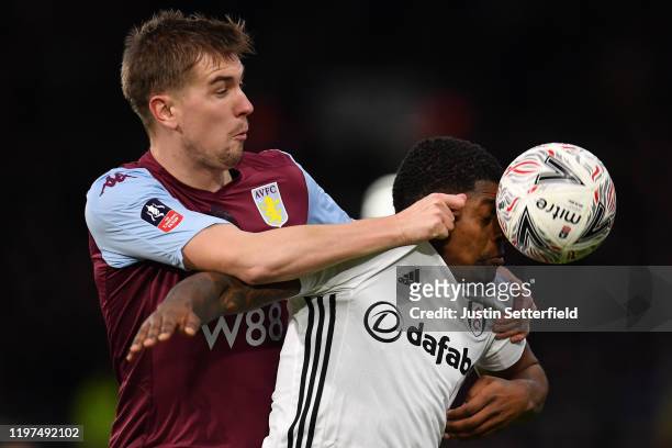 Ivan Cavaleiro of Fulham battles for possession with Bjorn Engels of Aston Villa during the FA Cup Third Round match between Fulham FC and Aston...