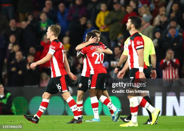 Jake Vokins of Southampton celebrates with teammate Michael Obafemi after scoring his team's second goal during the FA Cup Third Round match between...