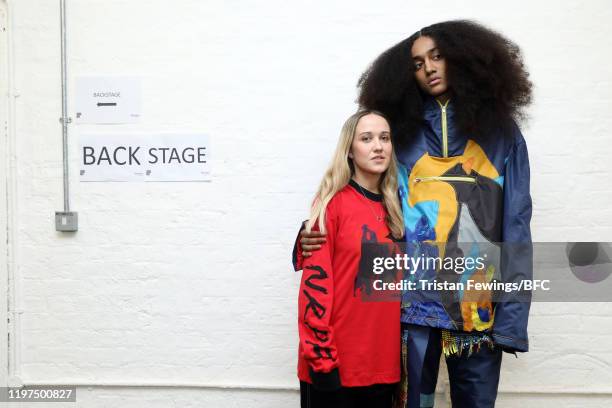 Designer Bethany Williams poses backstage with a model ahead of the Bethany Williams show during London Fashion Week Men's January 2020 at the BFC...