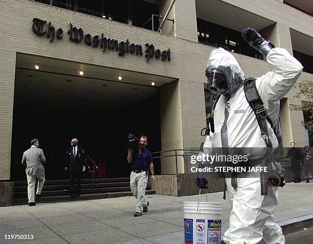 Hazardous Waste Firefighter from Walter Reed Army Medical Center prepares to enter the Washington Post building 16 October 2001 in Washington DC. The...