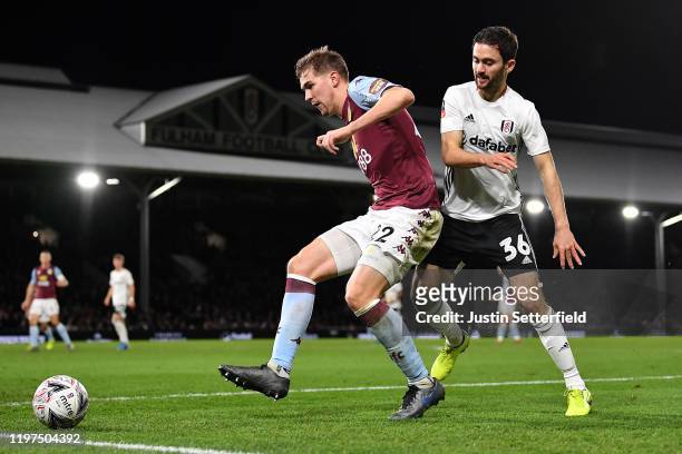 Bjorn Engels of Aston Villa and Luca De La Torre of Fulham in action during the FA Cup Third Round match between Fulham FC and Aston Villa at Craven...