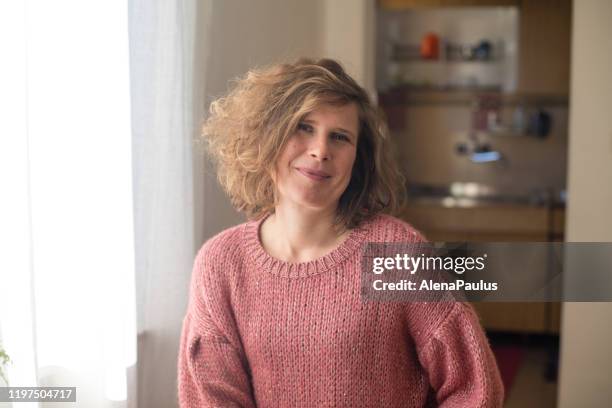 curly woman portrait - showus hair stock pictures, royalty-free photos & images