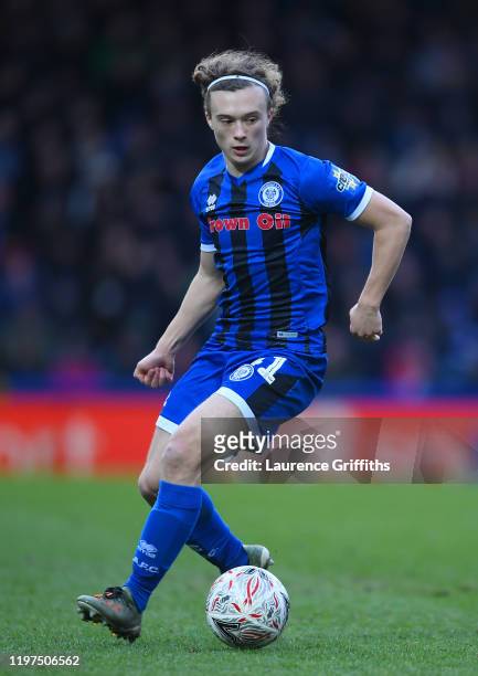 Luke Matheson of Rochdale runs with the ball during the FA Cup Third Round match between Rochdale AFC and Newcastle Untied at Spotland Stadium on...