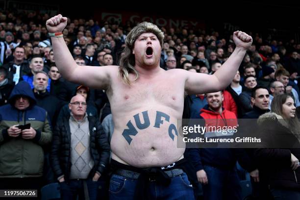 Newcastle United fan cheers on his team during the FA Cup Third Round match between Rochdale AFC and Newcastle Untied at Spotland Stadium on January...