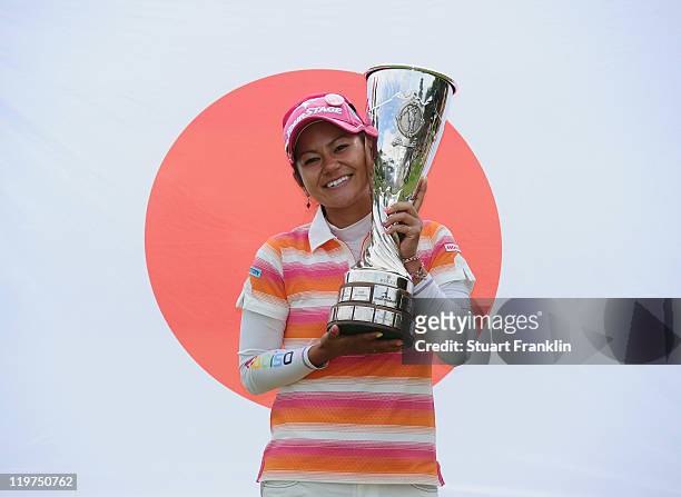 Ai Miyazato of Japan with the trophy for winning the Evian Masters at the Evian Masters golf club on July 23, 2011 in Evian-les-Bains, France.