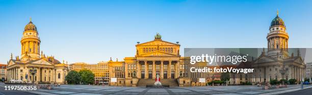 berlin gendarmenmarkt square panorama illuminated at sunrise germany - gendarmenmarkt stock pictures, royalty-free photos & images