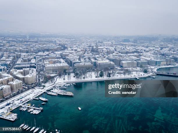 beautiful snow covered geneva city in winter time - geneva stock pictures, royalty-free photos & images