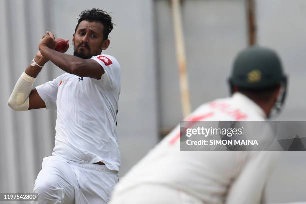 Sri Lanka's Suranga Lakmal delivers a ball to Zimbabwe's Brendan Taylor during the fourth day of the second Test cricket match between Zimbabwe and...