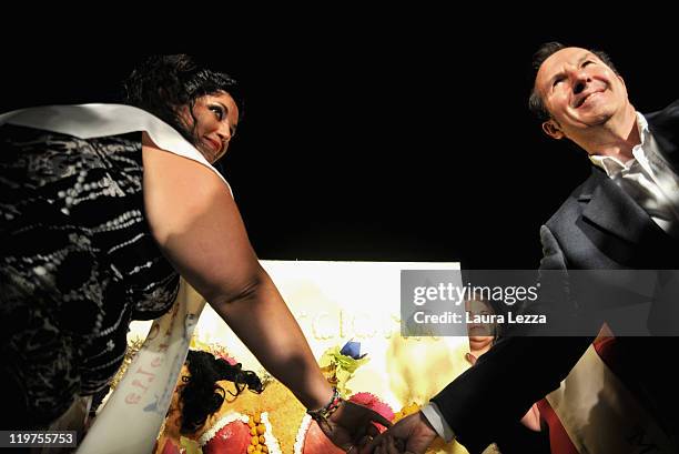 The patron of Miss Cicciona Gianfranco Lazzereschi poses with Miss Cicciona Ornella Chiapperini during the 22nd edition of the Italian 'Miss...