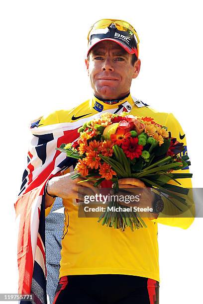 Cadel Evans of team BMC celebrates on the podium after winning the 2011 Tour de France after the twenty first and final stage of Le Tour de France...