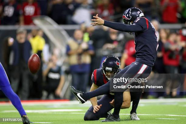 Ka'imi Fairbairn of the Houston Texans kicks the game-winning field goal in overtime to give his teams the 22-19 win against the Buffalo Bills in the...