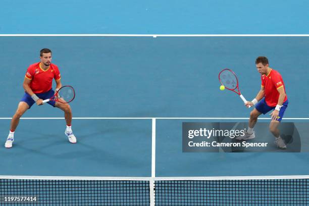 Radu Albot and Alexander Cozbinov of Moldova play a shot during their Group C doubles match against Grigor Dimitrov and Alexander Lazarov of Bulgaria...