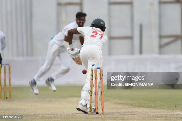 Zimbabwe's Tinotenda Mutombodzi is bowled by Sri Lanka's Suranga Lakmal during the fourth day of the second Test cricket match between Zimbabwe and...