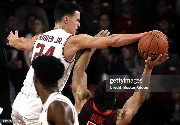 Boston College Eagles guard Chris Herren Jr. Stuffs Virginia Tech Hokies guard Wabissa Bede during the second half. Boston College men's basketball...