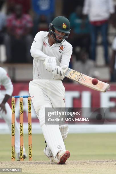 Zimbabwe's captain Sean Williams plays a shot during the fourth day of the second Test cricket match between Zimbabwe and Sri Lanka at the Harare...