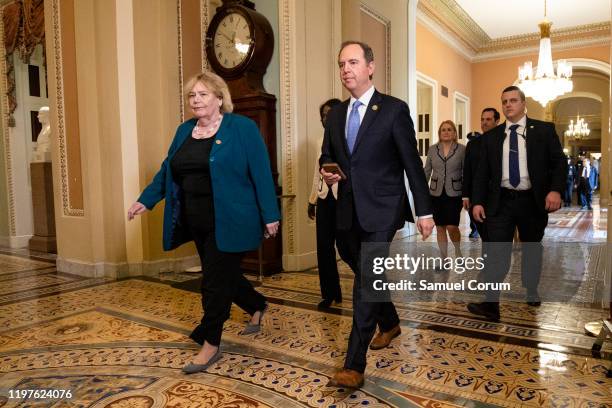 House impeachment managers Rep. Zoe Lofgren , Rep. Val Demings , Rep. Adam Schiff , and Rep. Sylvia Garcia head to the Senate floor for the start of...