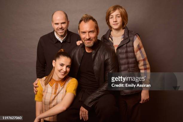 Sean Durkin, Oona Roche, Jude Law, and Charlie Shotwell from The Nest pose for a portrait at the Pizza Hut Lounge on January 26, 2020 in Park City,...
