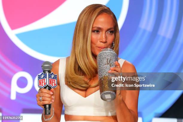 Jennifer Lopez and her bling cup during the Pepsi Super Bowl LIV Halftime show press conference on January 30, 2020 at the Hilton Downtown Miami in...