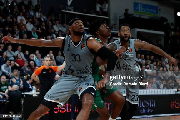 Adreian Payne, #33 of LDLC Asvel Villeurbanne and Zach LeDay, #32 of Zalgiris Kaunas and David Lighty, #23 of LDLC Asvel Villeurbanne in action...