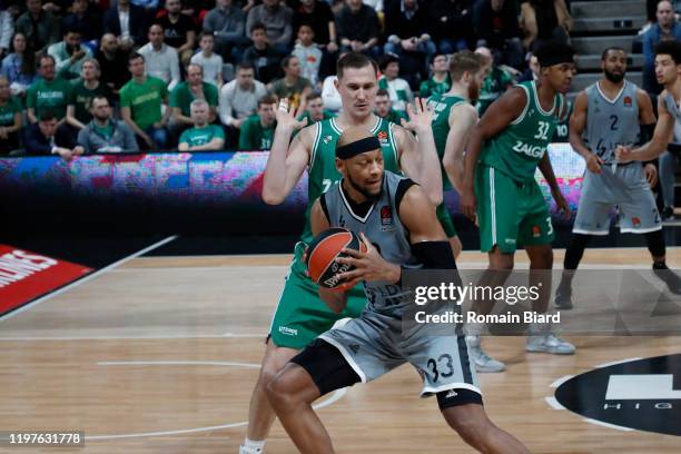 Adreian Payne, #33 of LDLC Asvel Villeurbanne and Paulius Jankunas, #13 of Zalgiris Kaunas in action during the 2019/2020 Turkish Airlines EuroLeague...