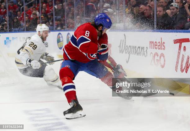 Ben Chiarot of the Montreal Canadiens plays a loose puck during the second period of play at the KeyBank Center on January 30, 2020 in Buffalo, New...