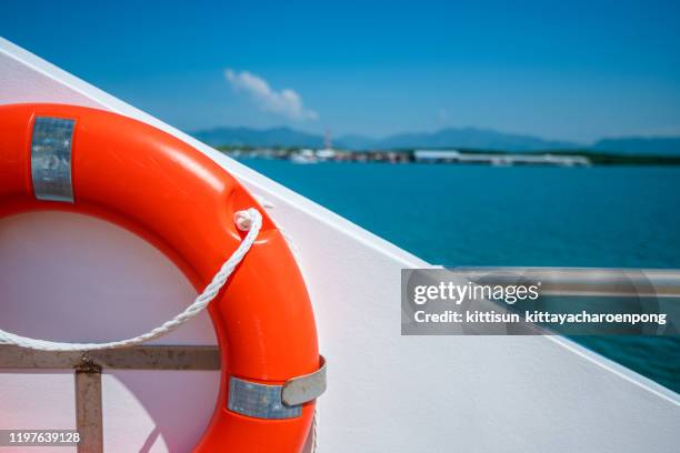 life guard ring buoy with sea view on the ship - life ring stockfoto's en -beelden