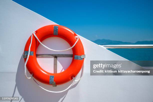 life guard ring buoy with sea view on the ship - boia equipamento marítimo de segurança imagens e fotografias de stock