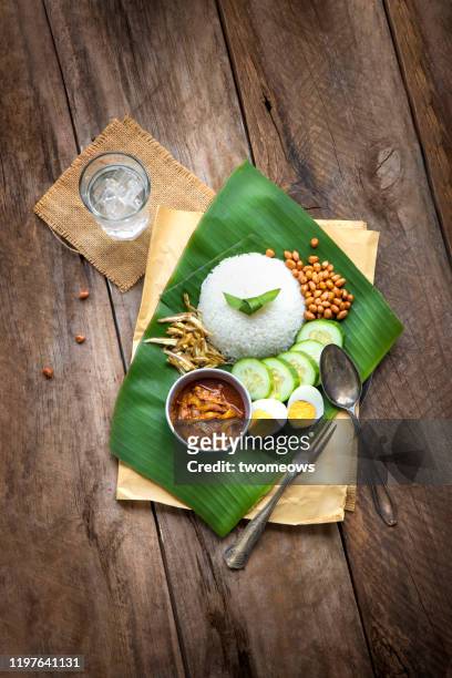 malaysian food 'nasi lemak'. - traditional malay food stock pictures, royalty-free photos & images