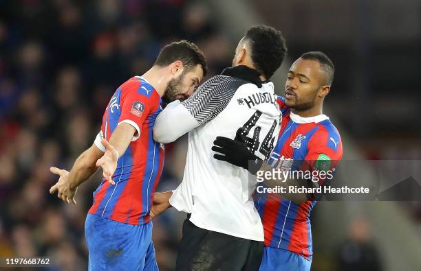 Luka Milivojevic of Crystal Palace clashes with Tom Huddlestone of Derby County resulting in a red card during the FA Cup Third Round match between...