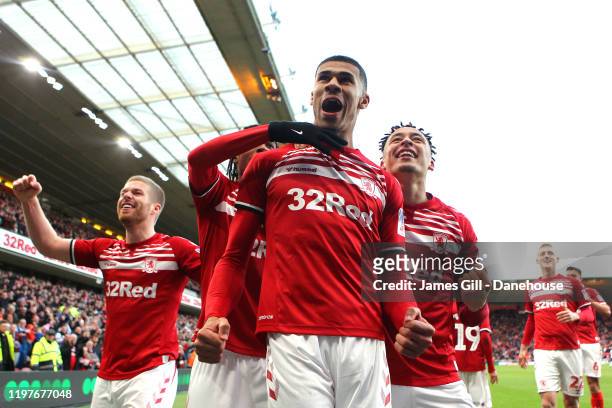 Ashley Fletcher of Middlesbrough celebrates with team mates after scoring his team's first goal during the FA Cup Third Round match between...