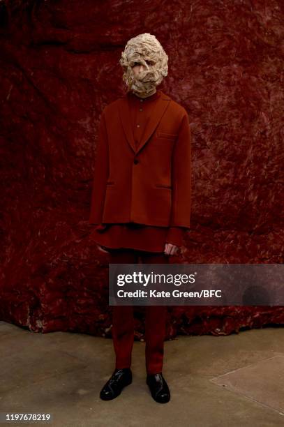 Model walks the runway at the Omar Afridi Presentation during London Fashion Week Men's January 2020 at the Dray Walk Gallery on January 05, 2020 in...