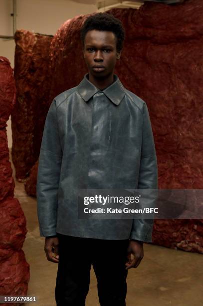 Model walks the runway at the Omar Afridi Presentation during London Fashion Week Men's January 2020 at the Dray Walk Gallery on January 05, 2020 in...