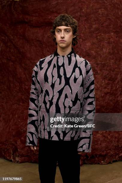 Model walks the runway at the Omar Afridi Presentation during London Fashion Week Men's January 2020 at the Dray Walk Gallery on January 05, 2020 in...