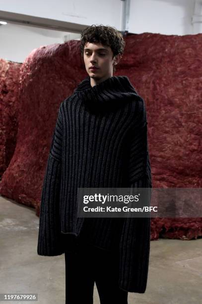 Model walks the runway at the Omar Afridi Presentation during London Fashion Week Men's January 2020 at the Dray Walk Gallery on January 05, 2020 in...