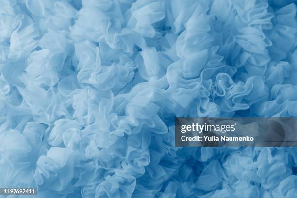 blue lightweight fabric mesh, texture of the fabric, beautifully draped background. - suave fotografías e imágenes de stock