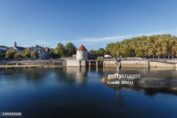 tour de la pelote, quai de strasbourg, an old french style fort and river in besancon, france - besancon photos et images de collection