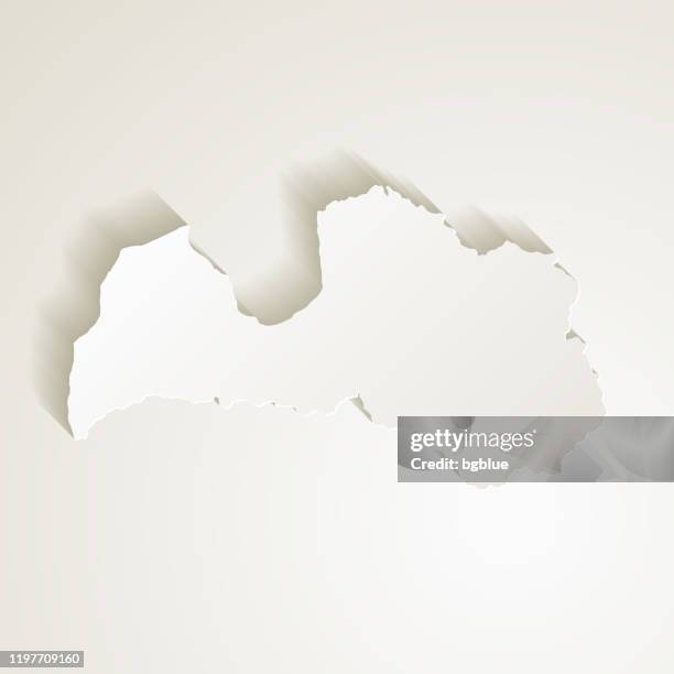 latvia map with paper cut effect on blank background - riga stock illustrations