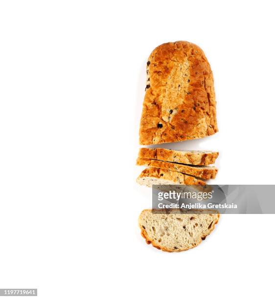 sliced kalamata olive bread isolated on white background - slice of bread stock pictures, royalty-free photos & images